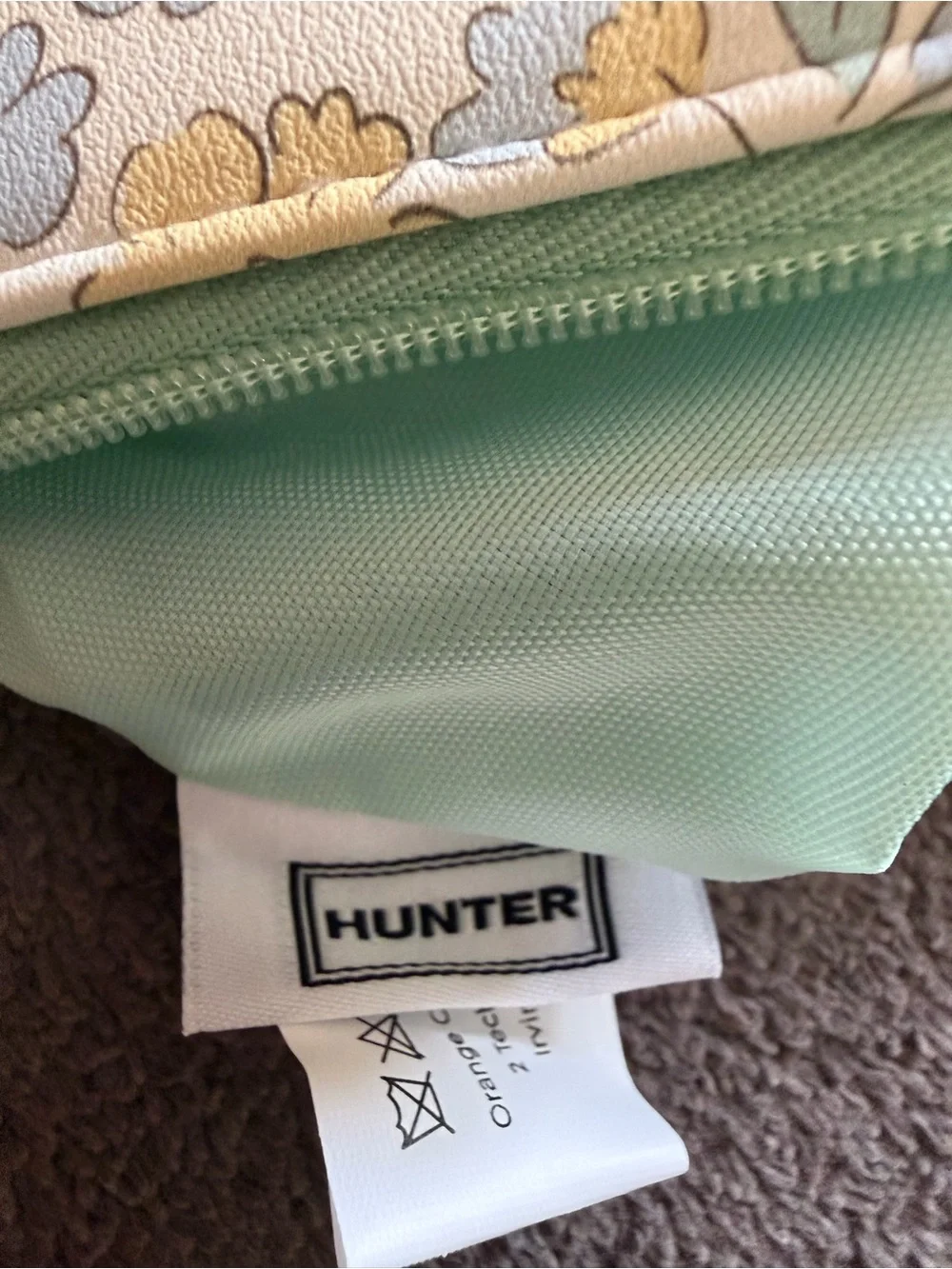 Hunter Floral Accent Pouch in Cream, Blue, Yellow